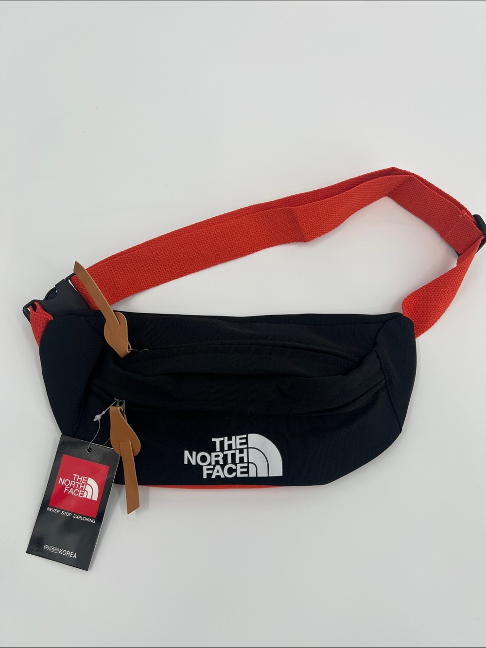 The North Face Black Belt Bag with Red Strap for Men & Women